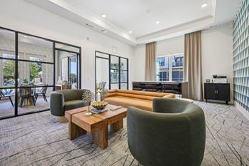 Large grey armchair and table